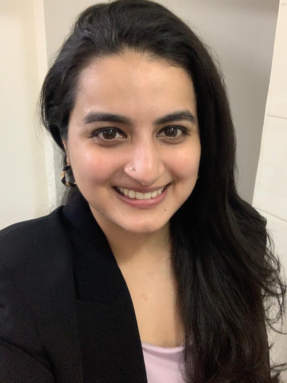 Author smiling at camera 
