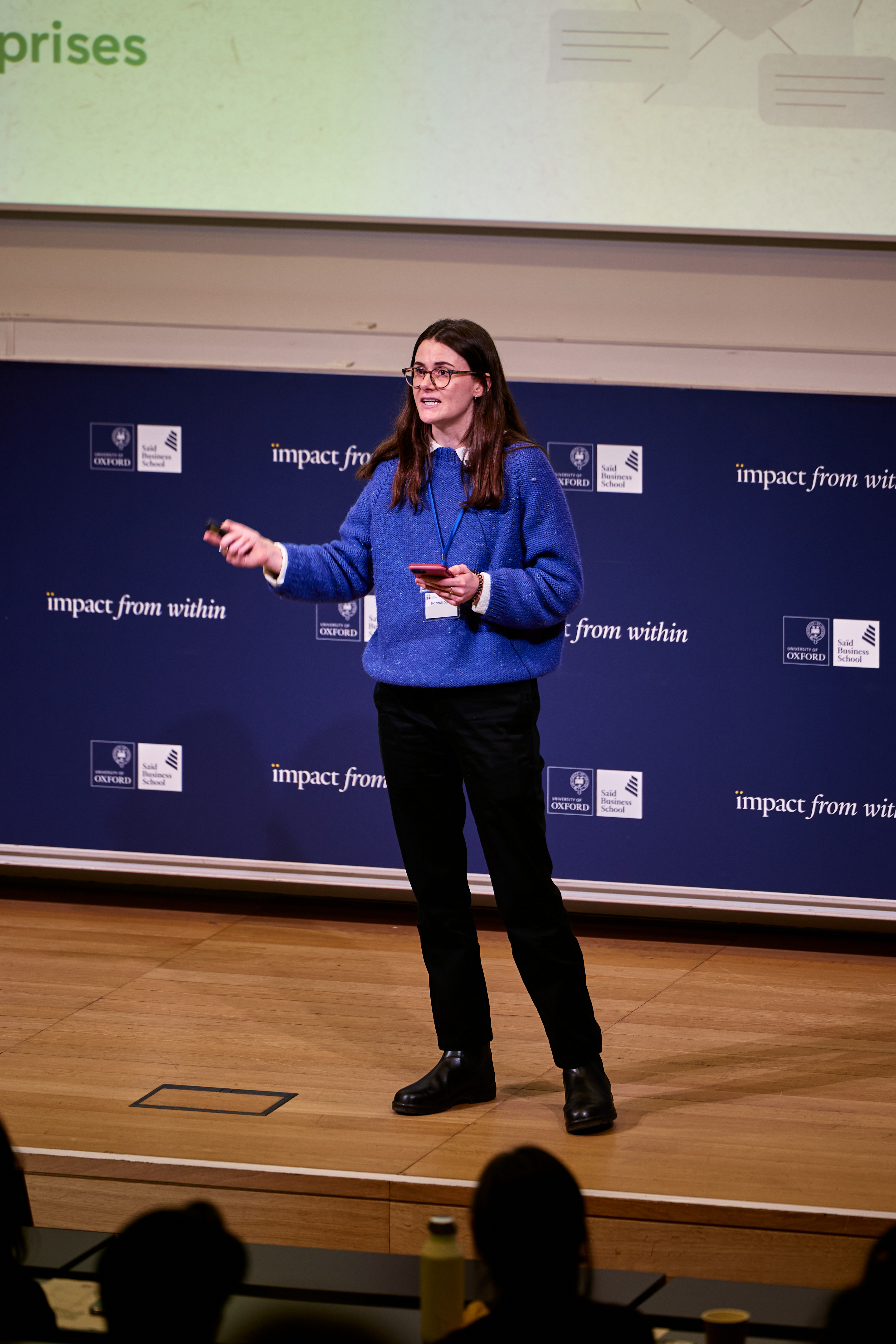 Hannah Sassi presenting on stage