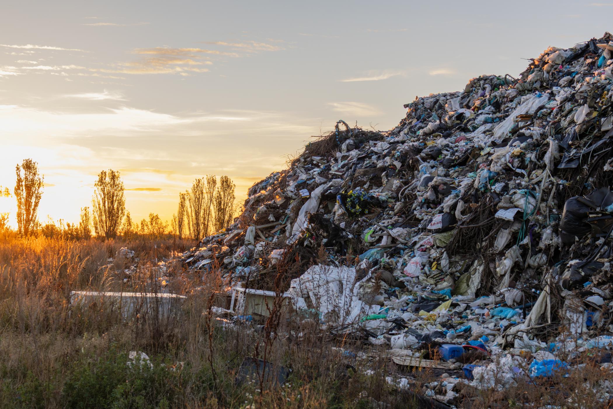 Pile of rubbish at sunset